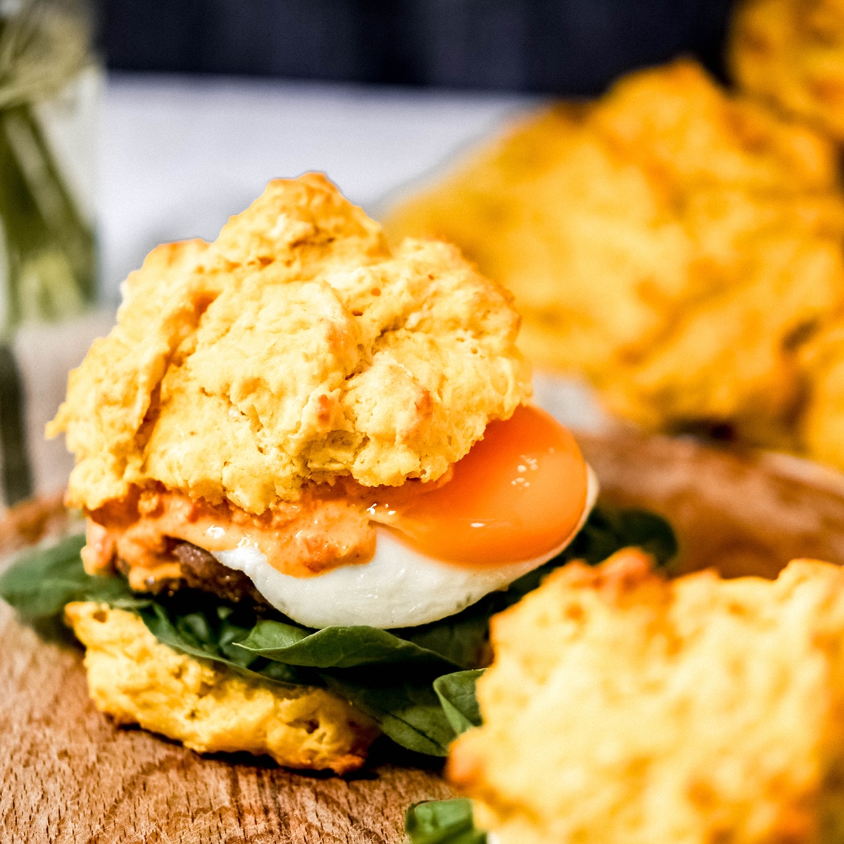 https://bewildeats.com/wp-content/uploads/2023/09/pumpkin-biscuit-breakfast-sandwich-overhead-recipe.jpg